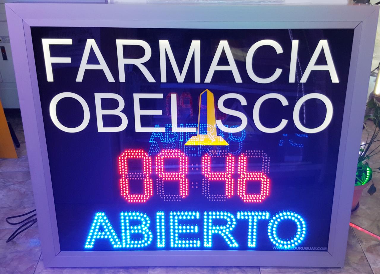 Cartel LED de farmacia con hora y la palabra abierto